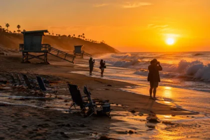 Crystal Cove closures scene with eroded beach access and shoreline barriers
