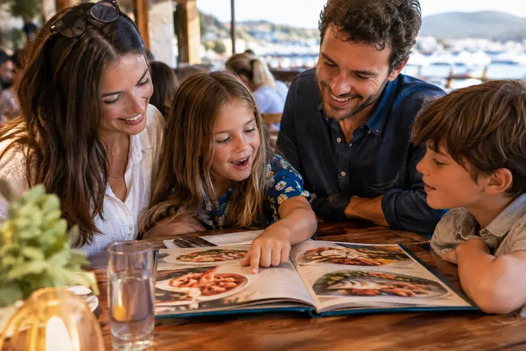 San Francisco waterfront diners reviewing options before a meal